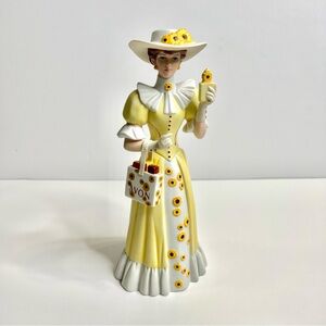 Avon 2012 Mrs Albee Presidents Club Award Porcelain Sunflower Lady Figurine